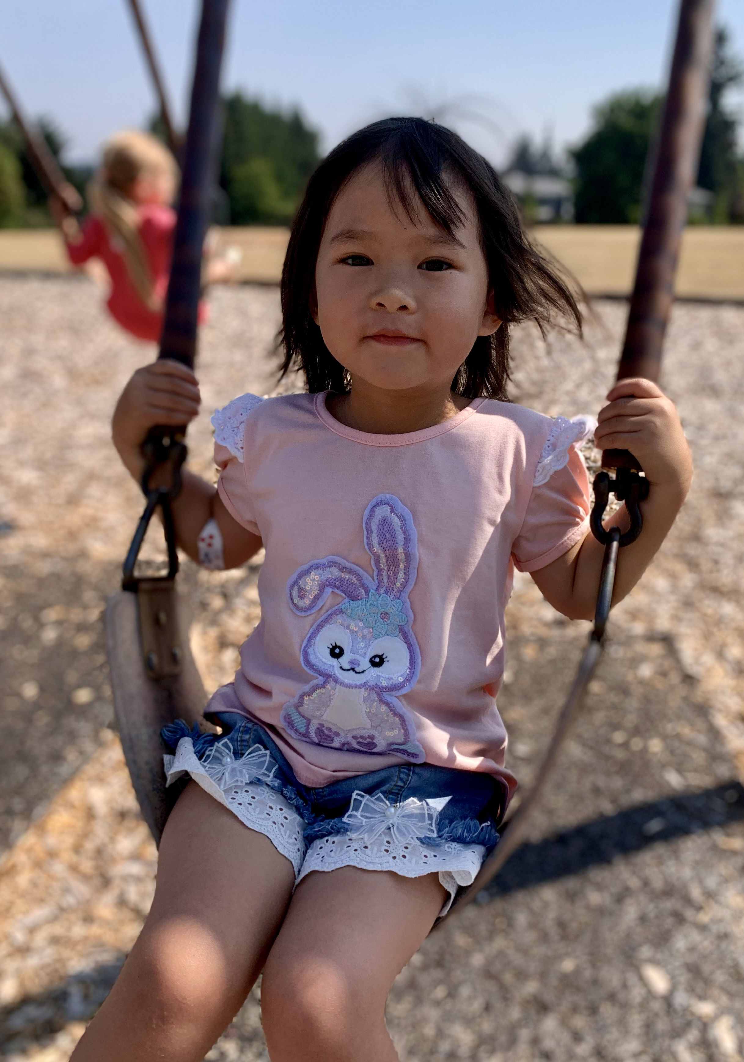 Swinging outside in fresh air at Little Blessings Preschool, Vancouver WA